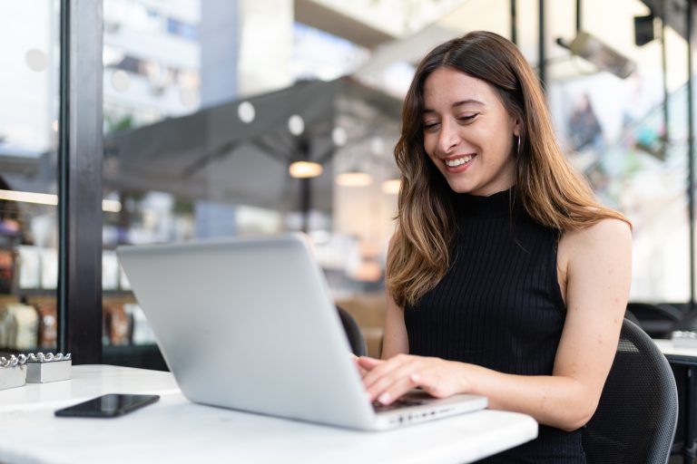 Young woman working on her laptop