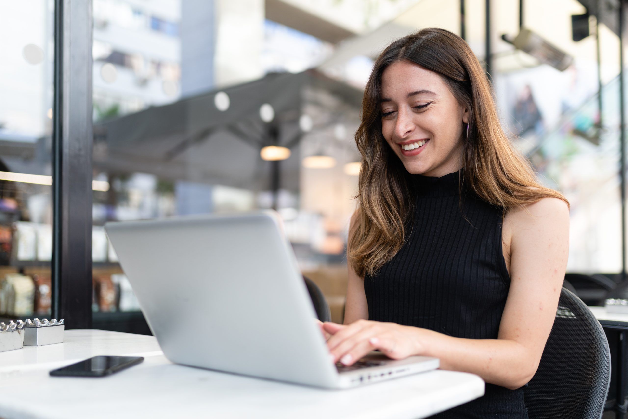 Young woman working on her laptop